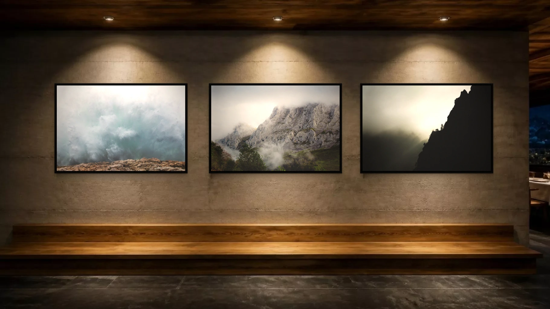 Mur de restaurant éclairé par trois spots, triptyque de paysages basques et du Vercors (simulation)